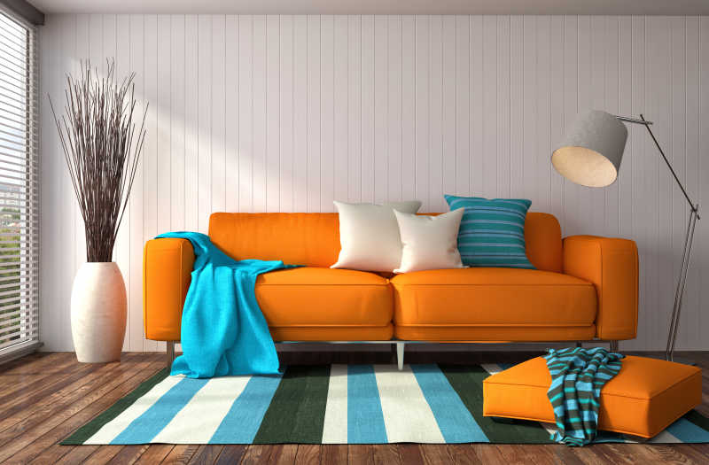 橘色沙发和坐垫在落地窗前阳光照射效果