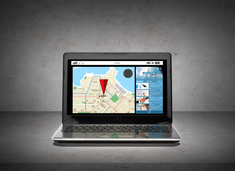 灰色背景下的屏幕上带GPS导航地图的笔记本电脑