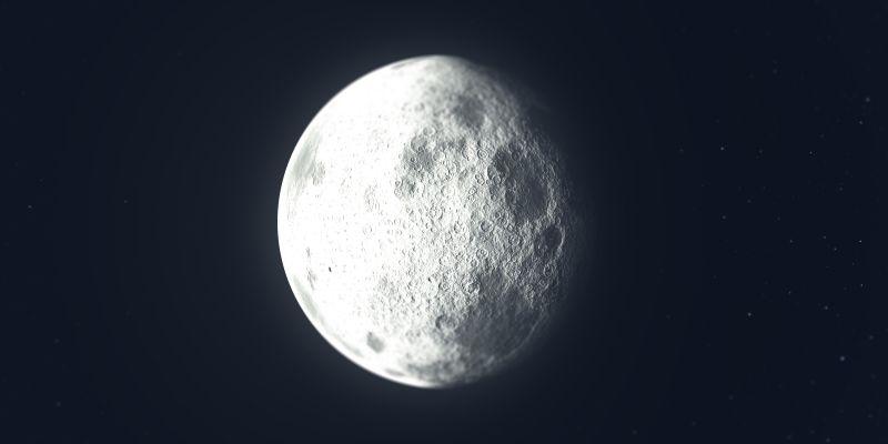 黑色背景前凸起的月亮