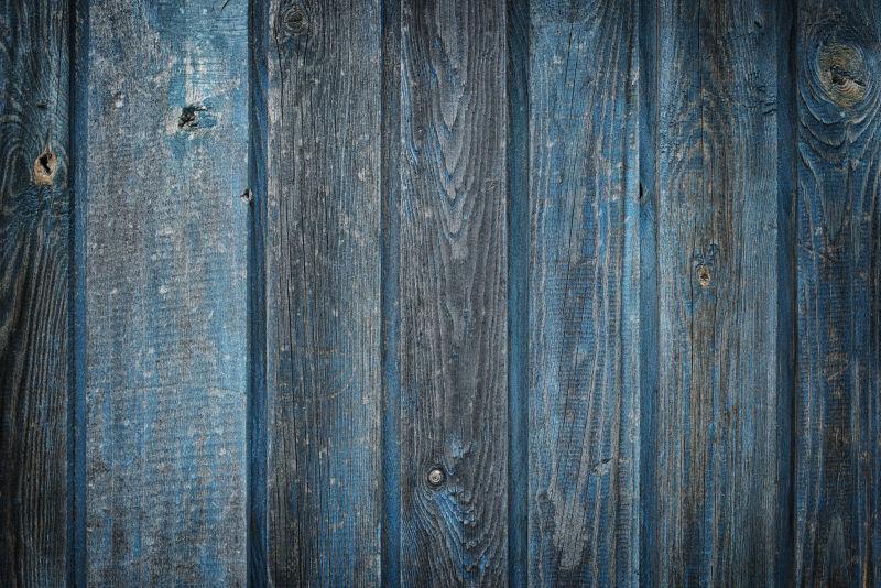 褪色破旧的蓝色木板