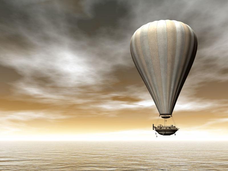 古色古香的热气球浮云漂浮在海洋中的棕色天空