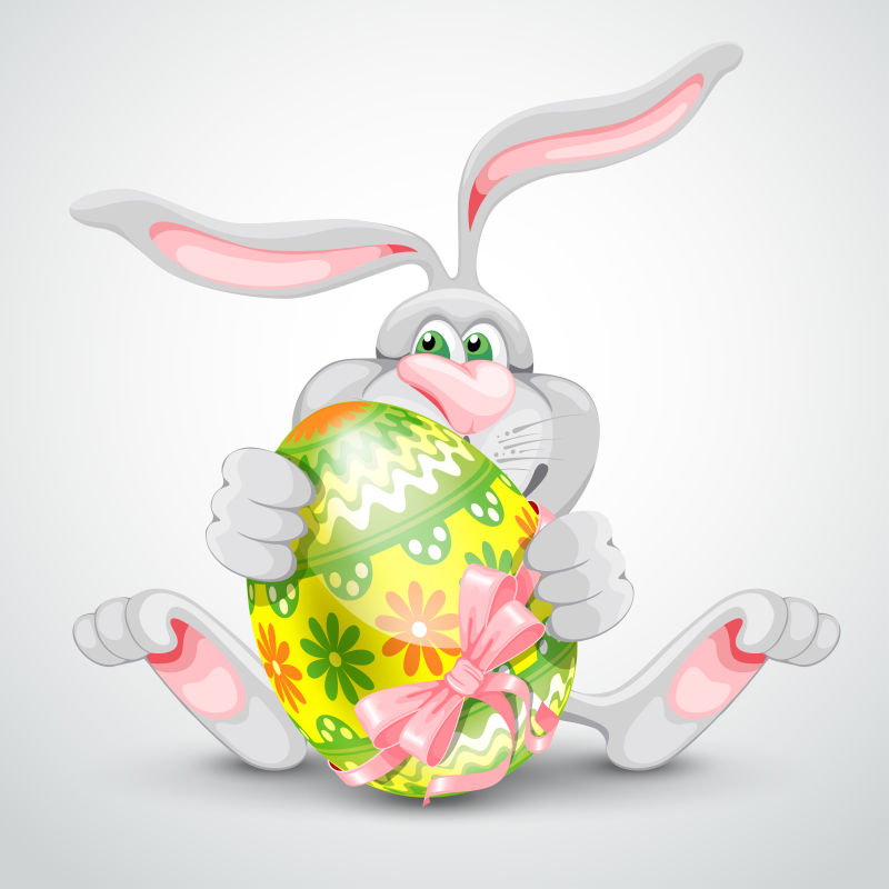 矢量拿着复活节彩蛋的兔子插图