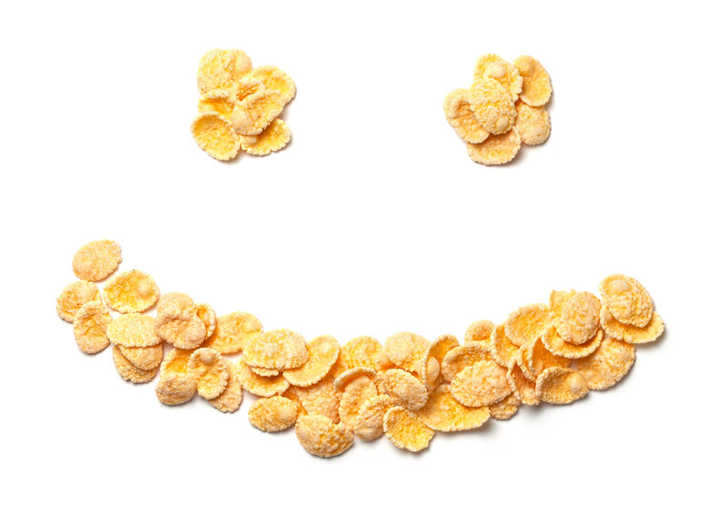 黄色玉米片符号脸白底独立微笑