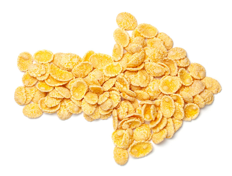 黄色玉米片符号右箭头独立于白色背景