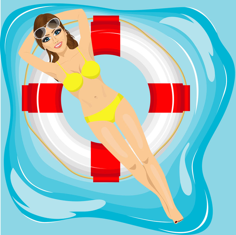 漂亮的年轻女子漂浮在游泳池里的充气圈上
