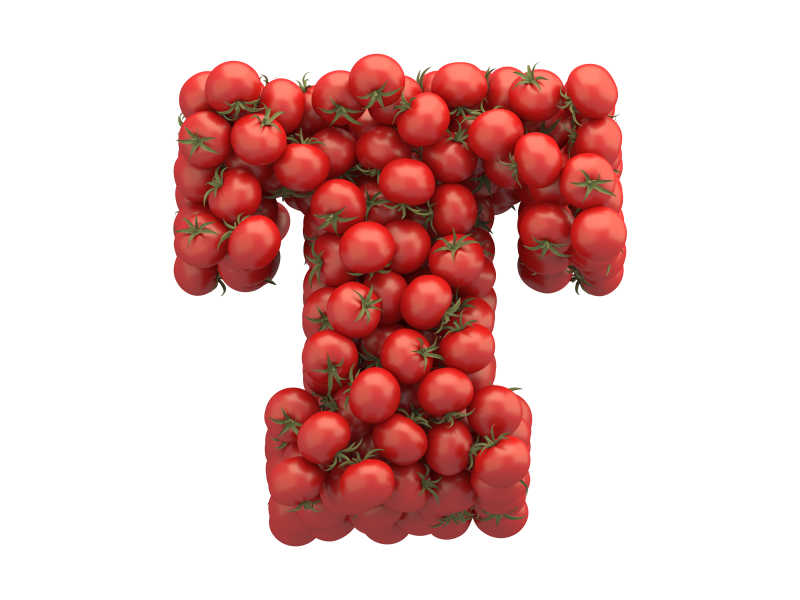白色背景上西红柿组成字母