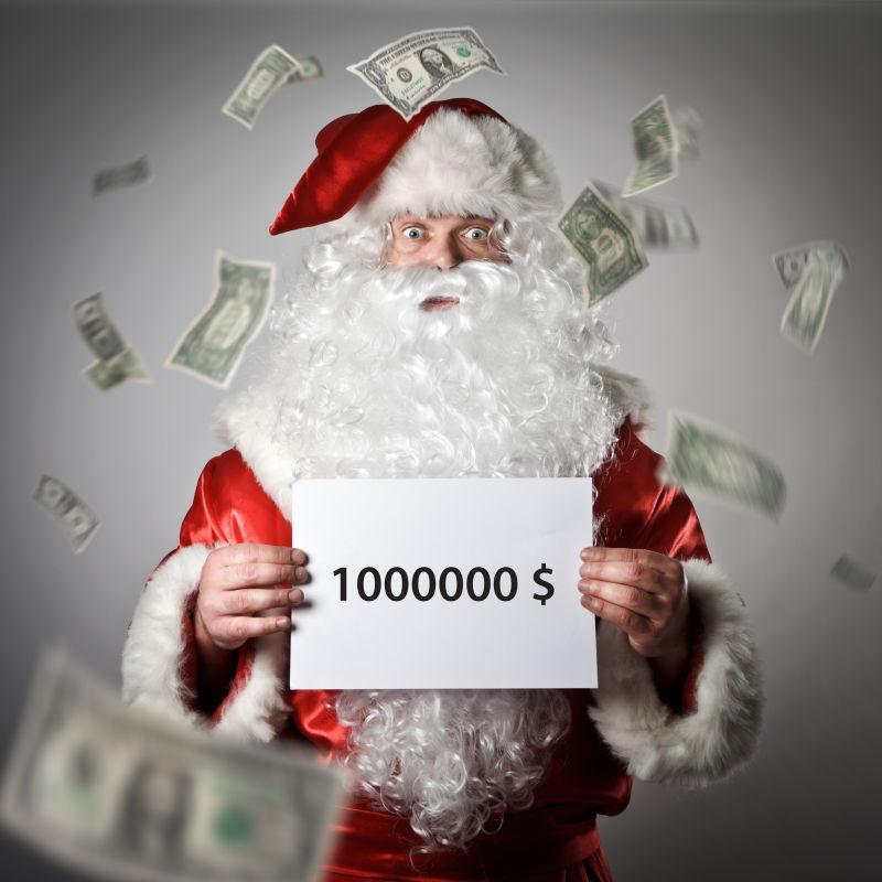 圣诞老人手拿写着100万金币的白纸
